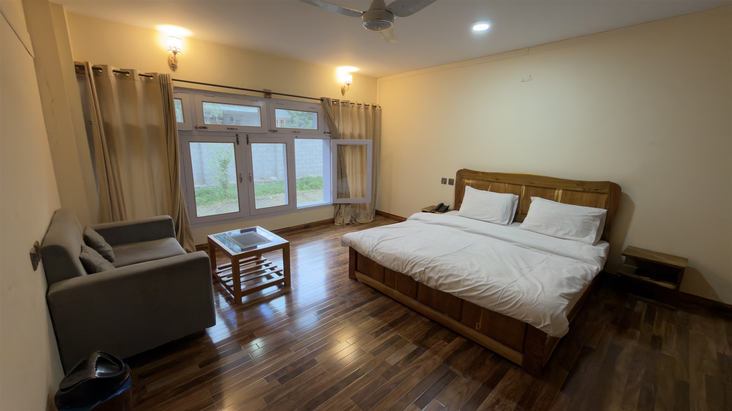 Luxury master bedroom with mountain views at Tibet Hotel Skardu